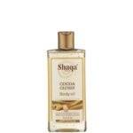 Flacon de l'huile corporelle au cacao Shaqa Shah Cocoa Glossy 250ml. Gel huile hydratant et éclatant au pur beurre de cacao avec indication 25% de bonus.